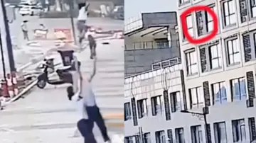 Infant falls from window of high-rise building, lands miraculously on man’s arms! Watch