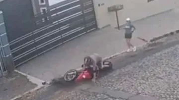 Man on bike tries to grope woman pedestrian, suffers instant karma