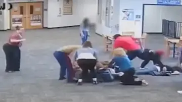 Teen student beats female teacher for taking way video game in class