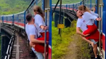 Couple locks lips on moving train ‘risking lives’