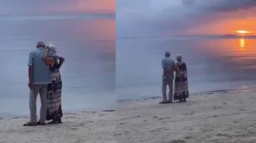 Elderly couple’s love on beach while enjoying warmth of sunset is winning internet, watch