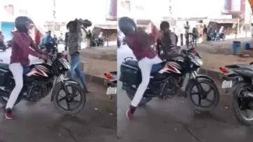 Biker’s narrow escape after attacked with big stone, watch