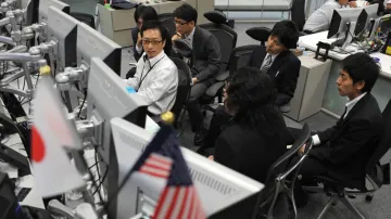 Stock markets across Asia fall as global banking fears widen