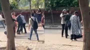 Boy & girl fight like rogues on University campus, watch