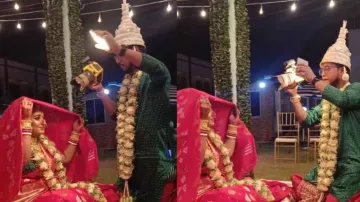 Photographer groom takes his bride's picture