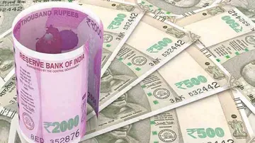 Rupee rises 10 paise against US dollar