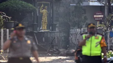 Nine killed, 35 hurt in blasts in three churches in Indonesia