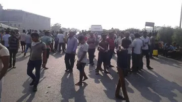 2 killed as truck hits motorcycle