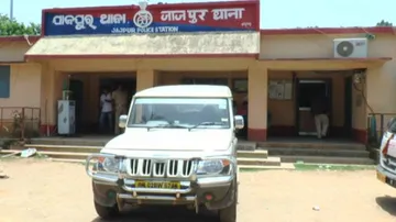 Youth thrashed by police for arriving late
