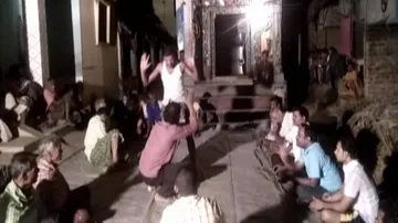 Two held for forcing teacher to pass through legs in kangaroo court
