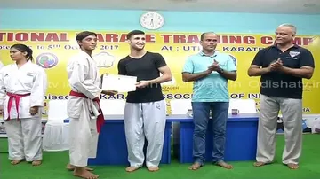 World Champion felicitates participants of National Karate Training Camp