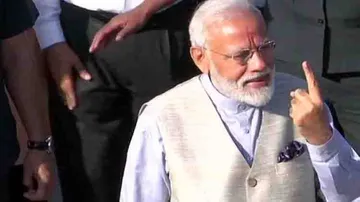 PM Narendra Modi casts his vote in Ahmedabad