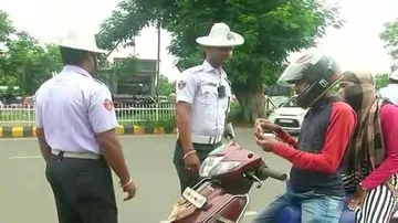 Beware! Odisha RTO Slaps Rs 25K On Minor For Riding Scooter, 1K Fine On Helmet Less Pillion