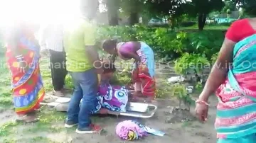 Ostracised woman delivers twins while walking to hospital