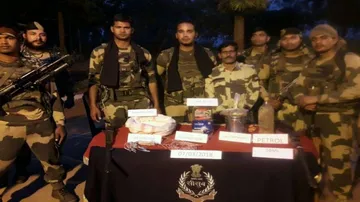BSF jawans recover huge cache of arms, ammunition from Maoist camp