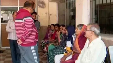 Odisha Minister Stands In Queue At Hospital To Avail Services