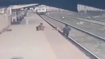Watch: Dramatic Rescue of Child By Railway Pointsman Seconds Before Imminent Run Over By Train Near Mumbai