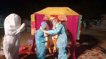WATCH: Rajasthan Couple Marries In PPE Kits After Bride Tests Positive For COVID-19