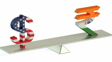 Rupee rebounds 13 paise against US dollar