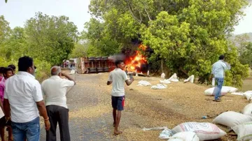 Driver, helper charred after trailer catches fire in accident