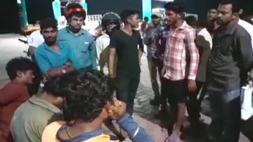 Youths forced down on kneels after brawl over coins