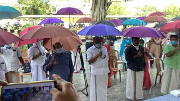 People advised to use umbrella for social distancing