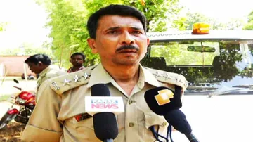 Suspected child abductor faces locals’ ire, four held
