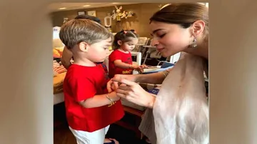 Alia performs 'didi' duties for KJo's son