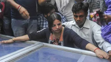 UP CM promises all help to slain Apple executive's wife