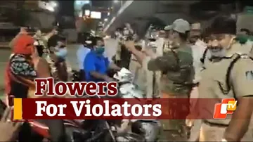 Must Watch: Police Garland Covid Norm Violators In Karnataka