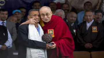 Dalai Lama embraces trooper who escorted him in 1959