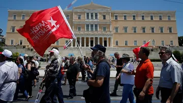 Greece hails 'historic' debt relief deal
