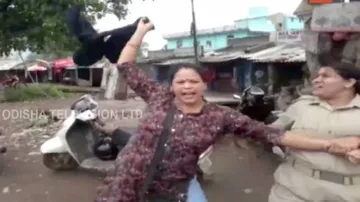BJP Mahila Morcha members wave black flags at minister Sushant Singh