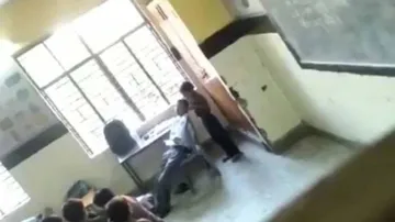 Teacher suspended for taking head massage from students