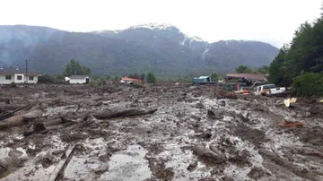 At least two dead, eight missing in Chile landslide