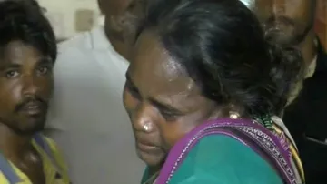 Minor girl crushed under car as 4 yr old fires engine inadvertently