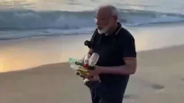 PM Modi Cleans TN Beach Ahead Of Talks With Xi