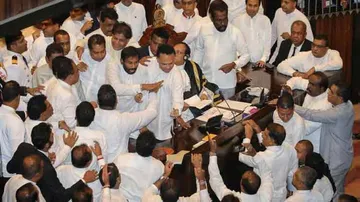 Sri Lanka MPs hurl chilli powder, chairs in Parliament commotion