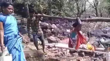 Pregnant woman delivers baby while being carried in sling in Malkangiri