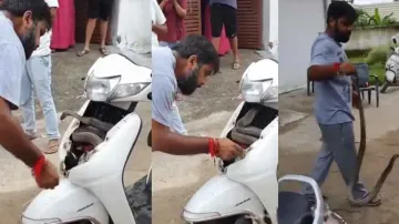 Cobra rescued from scooter’s front nose by fearless man without professional gears, watch