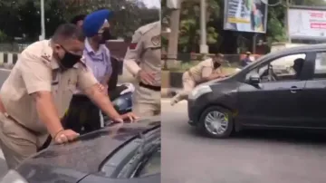 Cop dragged on car bonnet, boy lands in trouble after getting caught; watch