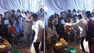 Angry groom starts kicking guest in front of bride during wedding