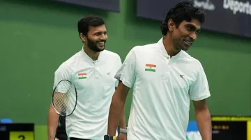Pramod Bhagat with his doubles partner Sukant Kadam