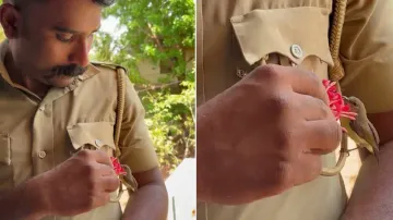 Cop’s sweet interaction with bird goes viral on the Internet