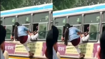 Daredevil girl climbs overcrowded bus through window, internet in shock – Watch