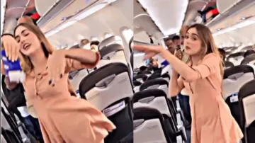 After Delhi Metro, viral video of girl dancing in the middle of flight angers netizens – Watch