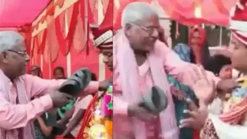 Groom hit with slippers by father for demanding bike in dowry, watch the consequences