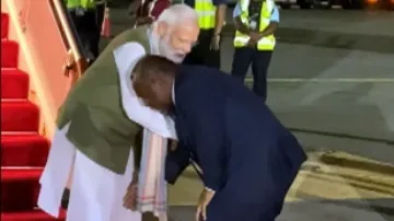 PM Marape touches PM Modi's feet
