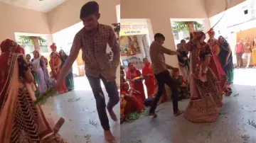 Newlywed bride & her ‘devar’ hit each other with sticks as part of ritual, netizens fumed; watch 