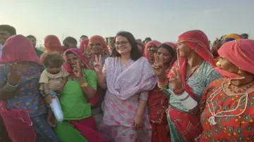 Tina Dabi with displaced Hindu immigrants